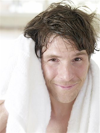 Man toweling himself Stock Photo - Premium Royalty-Free, Code: 689-03130571