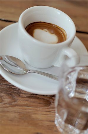 preparing cappucino - Espresso with milk froth topping Stock Photo - Premium Royalty-Free, Code: 689-03130647