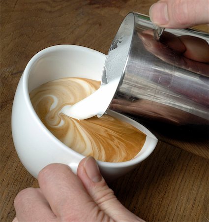 preparation of a cappuccino - Milk froth for a cappuccino Stock Photo - Premium Royalty-Free, Code: 689-03130683