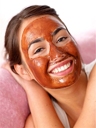 Young woman with chocolate mask Stock Photo - Premium Royalty-Free, Code: 689-03130823