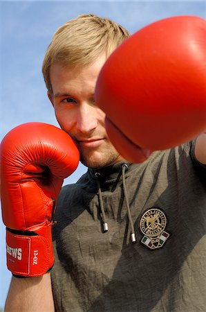 Man with boxing gloves Stock Photo - Premium Royalty-Free, Code: 689-03130983