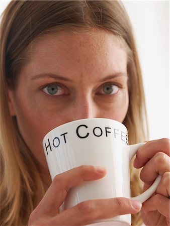 simsearch:689-03131264,k - young woman with a cup of coffee Stock Photo - Premium Royalty-Free, Code: 689-03131299