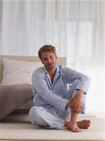 young man in blue pyjamas Stock Photo - Premium Royalty-Free, Code: 689-03131323