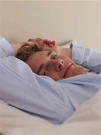 simsearch:689-03131313,k - young man in bed Stock Photo - Premium Royalty-Free, Code: 689-03131345