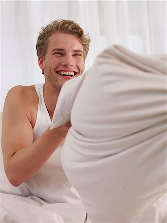 simsearch:689-03131313,k - pillow fight Stock Photo - Premium Royalty-Free, Code: 689-03131356