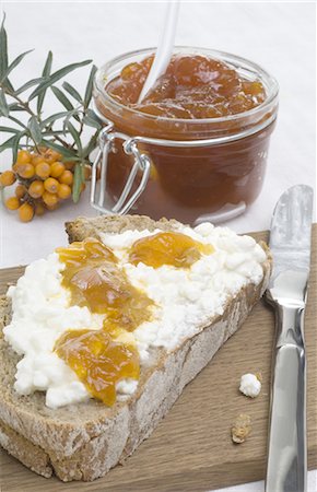 Bread with cottage cheese and sea buckthorn jam Stock Photo - Premium Royalty-Free, Code: 689-03733135