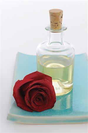 Rose oil and red rose Stock Photo - Premium Royalty-Free, Code: 689-03733549