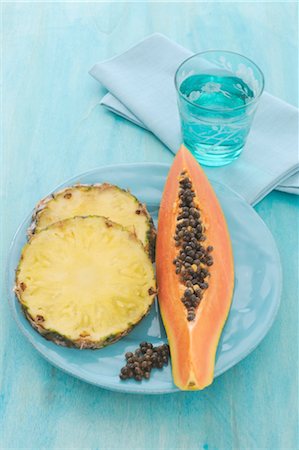 simsearch:853-06120493,k - Pineapple and papaya on plate Stock Photo - Premium Royalty-Free, Code: 689-03733552