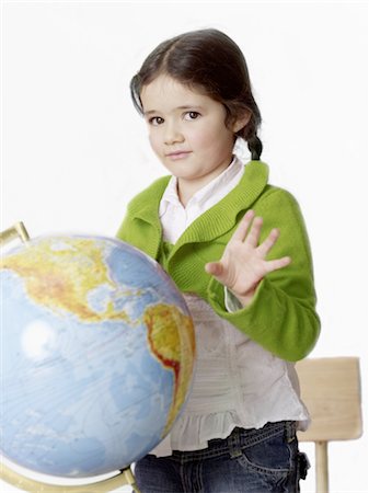 Girl with globe Stock Photo - Premium Royalty-Free, Code: 689-03733580