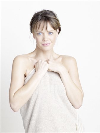 Woman wrapped in a towel Stock Photo - Premium Royalty-Free, Code: 689-03733711