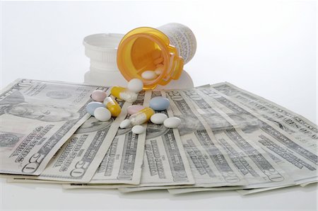 production (manufacturing) - Pills and dollars Stock Photo - Premium Royalty-Free, Code: 689-03733741