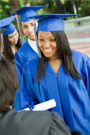 simsearch:693-06014222,k - Graduate shaking hand of dean outside Stock Photo - Premium Royalty-Free, Code: 694-03318818
