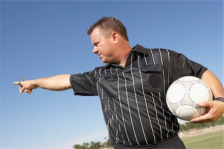 referee (male) - Soccer Referee Gesturing Foto de stock - Sin royalties Premium, Código: 694-03318887