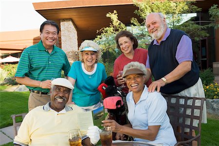 simsearch:694-03318961,k - Gruppe der leitenden Golfer Erfolge feiern, entspannen, (Hochformat) Stockbilder - Premium RF Lizenzfrei, Bildnummer: 694-03318931