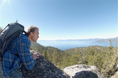 simsearch:6119-07968982,k - Male hiker looking at view from mountain Stock Photo - Premium Royalty-Free, Code: 694-03319478
