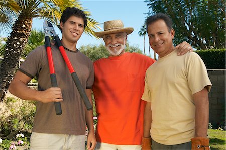 elderly latino man - Portrait of three men gardening Stock Photo - Premium Royalty-Free, Code: 694-03327179
