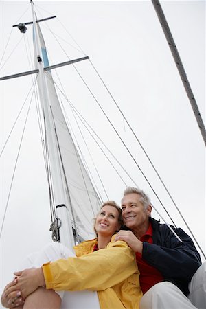fair haired mature male boat - Couple on yacht, low angle view Stock Photo - Premium Royalty-Free, Code: 694-03327255