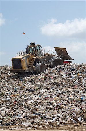 simsearch:694-03327856,k - Digger working at landfill site Stock Photo - Premium Royalty-Free, Code: 694-03327871