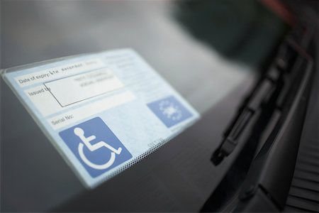 sticker - Handicap sticker on windshield Stock Photo - Premium Royalty-Free, Code: 694-03328143