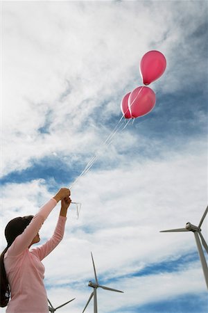 simsearch:694-03328218,k - Girl (7-9) spielen mit Luftballons am Windpark Stockbilder - Premium RF Lizenzfrei, Bildnummer: 694-03328204