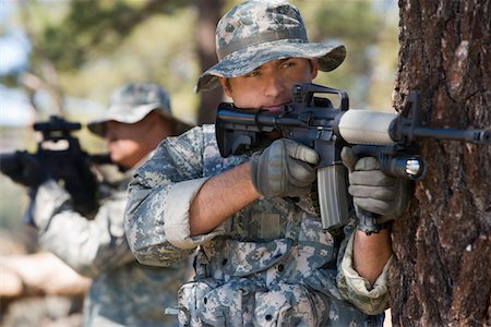 Soldiers aiming machine guns Stock Photo - Premium Royalty-Free, Code: 694-03328362