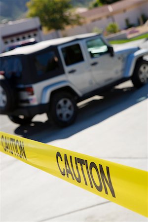 emergency tape - Jeep Behind Police Tape Stock Photo - Premium Royalty-Free, Code: 694-03328480