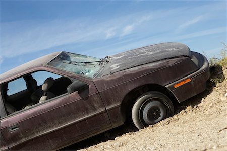 Abandoned car on roadside Stock Photo - Premium Royalty-Free, Code: 694-03328547