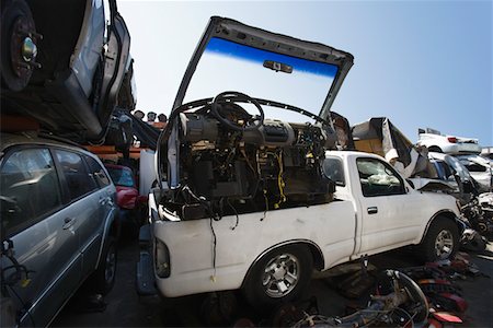 scrap yard pile of cars - Cars in junkyard Stock Photo - Premium Royalty-Free, Code: 694-03328728