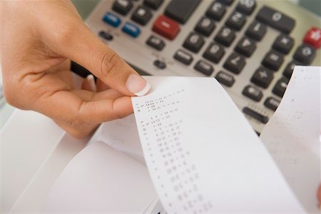 Woman with Adding Machine Tape Foto de stock - Sin royalties Premium, Código: 694-03329181