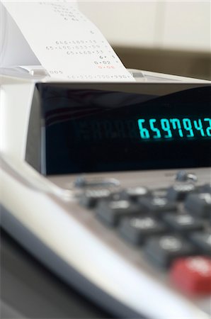 Adding Machine Stock Photo - Premium Royalty-Free, Code: 694-03329448