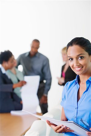 executive posing - Businesswoman in Meeting Stock Photo - Premium Royalty-Free, Code: 694-03329967