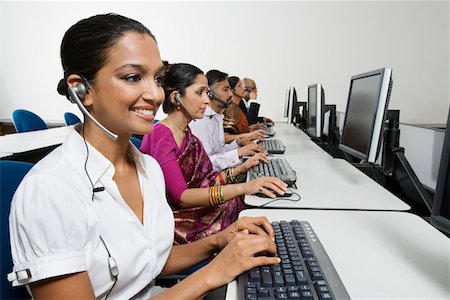 Customer Service Reps in Call Center Foto de stock - Sin royalties Premium, Código: 694-03329993