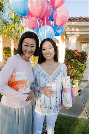 pregnant older - Pregnant Asian Woman with Mother at a Baby Shower Stock Photo - Premium Royalty-Free, Code: 694-03322315