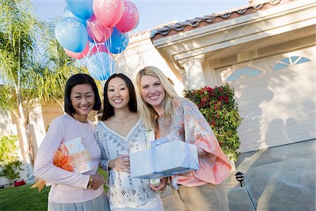 pregnant older - Pregnant Asian Woman with Mother and Friend at a Baby Shower Stock Photo - Premium Royalty-Free, Code: 694-03322316