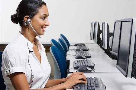 Customer Service Rep in Call Center Stock Photo - Premium Royalty-Free, Code: 694-03330007