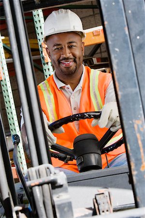 Forklift Driver Foto de stock - Sin royalties Premium, Código: 694-03330293