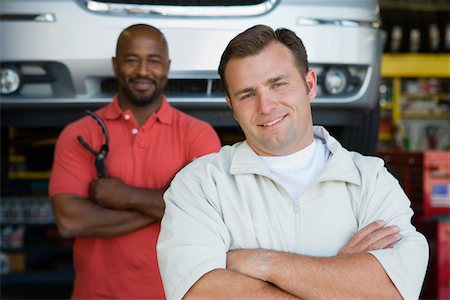 portrait car mechanic - Two Men in an Auto Shop Stock Photo - Premium Royalty-Free, Code: 694-03330318