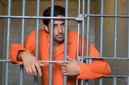 simsearch:694-03330729,k - Portrait of prisoner in jail Foto de stock - Royalty Free Premium, Número: 694-03330730