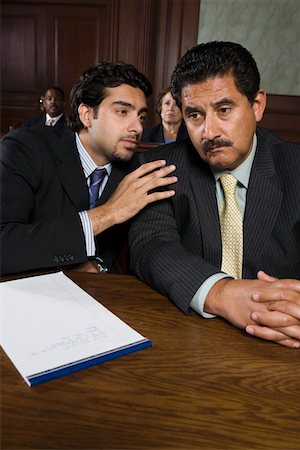 defense lawyer - Two men sitting in court Stock Photo - Premium Royalty-Free, Code: 694-03330839