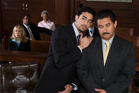 Two men sitting in court Stock Photo - Premium Royalty-Free, Code: 694-03330841