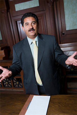 simsearch:694-03330980,k - Man standing in court, portrait Stock Photo - Premium Royalty-Free, Code: 694-03330865