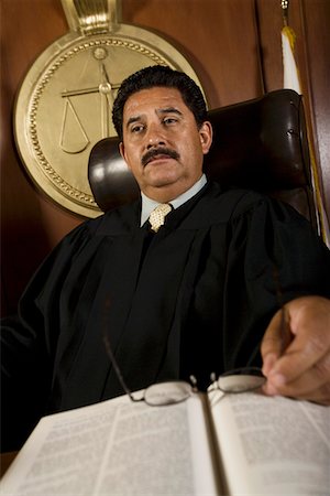 simsearch:694-03330980,k - Pensive judge in court Stock Photo - Premium Royalty-Free, Code: 694-03330889