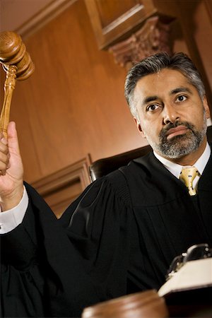 simsearch:693-03312783,k - Middle-aged judge forming sentence Stock Photo - Premium Royalty-Free, Code: 694-03330941