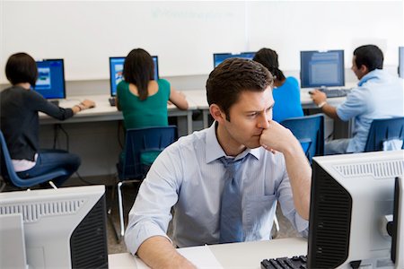 female teenagers students in a class - High School Teacher in Computer Lab Stock Photo - Premium Royalty-Free, Code: 694-03331134