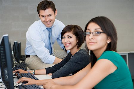 female teenagers students in a class - Teacher and Students in Computer Lab Stock Photo - Premium Royalty-Free, Code: 694-03331140