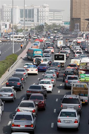 deira - Dubai, UAE, Traffic is backed up on Al-Maktoum Road in Deira; traffic in Dubai during morning. Fotografie stock - Premium Royalty-Free, Codice: 694-03331848