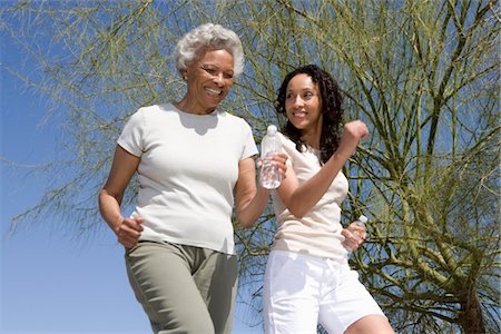 seniors running outdoors - Mother and daughter jog together Stock Photo - Premium Royalty-Free, Code: 694-03332059