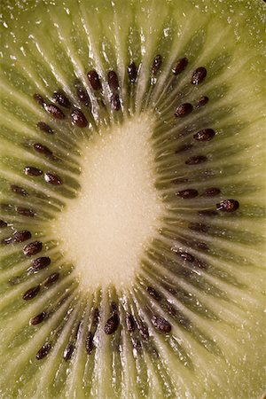 Close-Up View Of Sliced Kiwi Fruit Stock Photo - Premium Royalty-Free, Code: 694-03332656