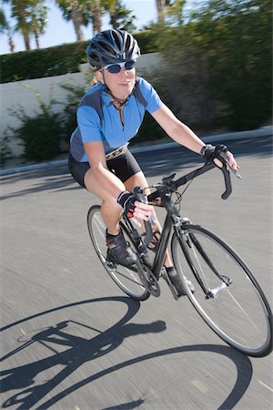 simsearch:694-03474723,k - Female road cyclist Stock Photo - Premium Royalty-Free, Code: 694-03474724