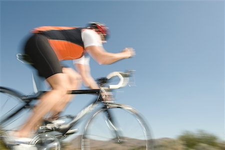 simsearch:694-03474723,k - Male cyclist, blurred motion Stock Photo - Premium Royalty-Free, Code: 694-03474720